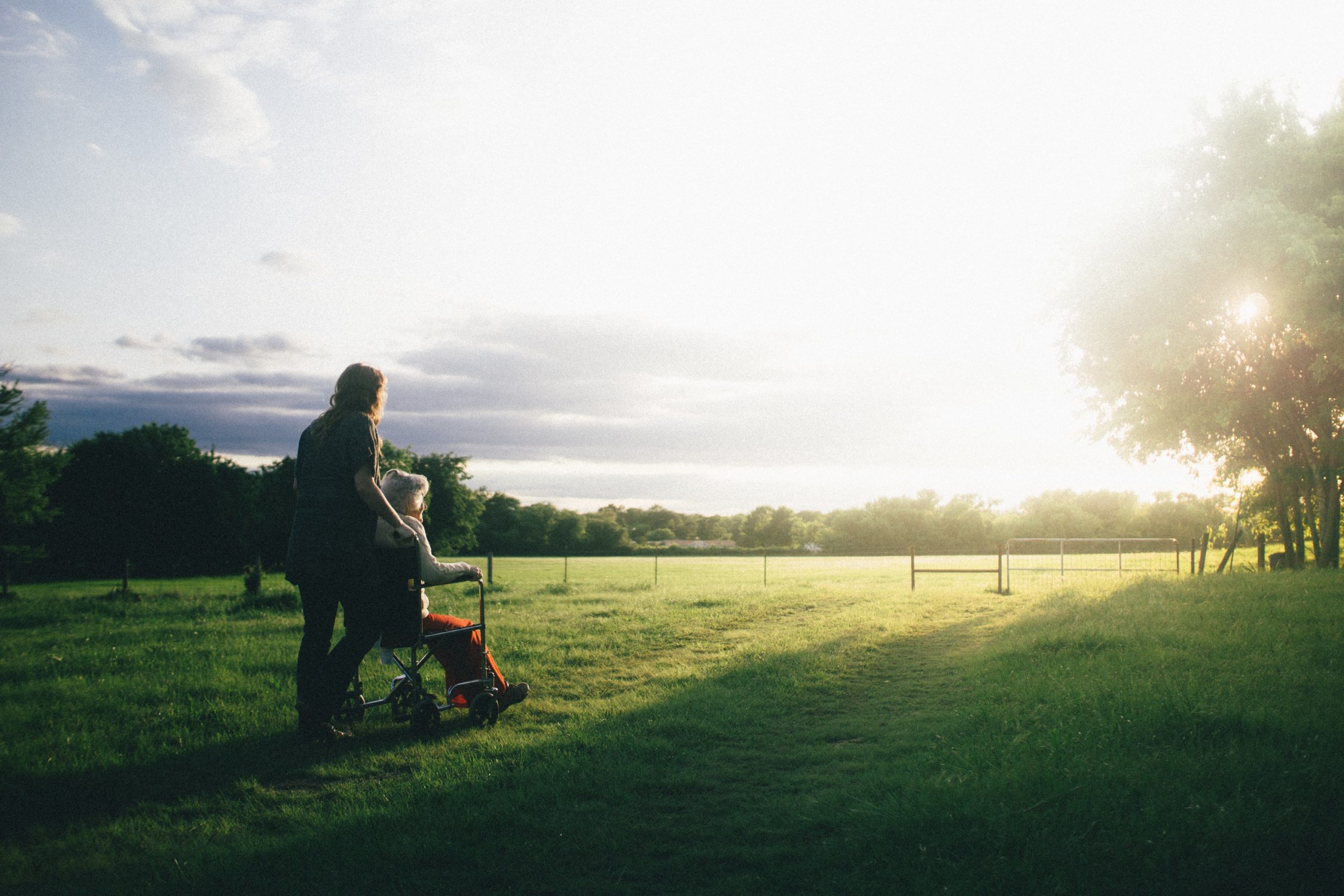 personal care assistant outside with patient