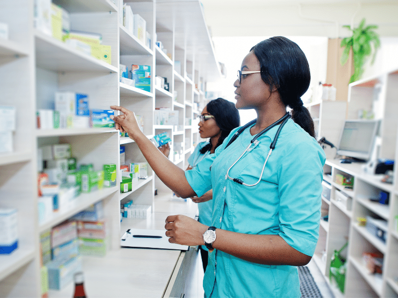 pharmacists working behind the counter